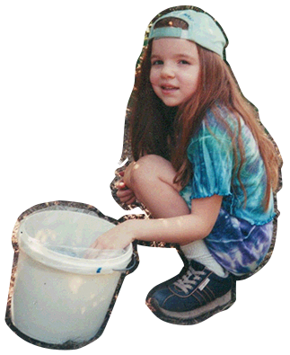 an image of a young girl picking blueberries